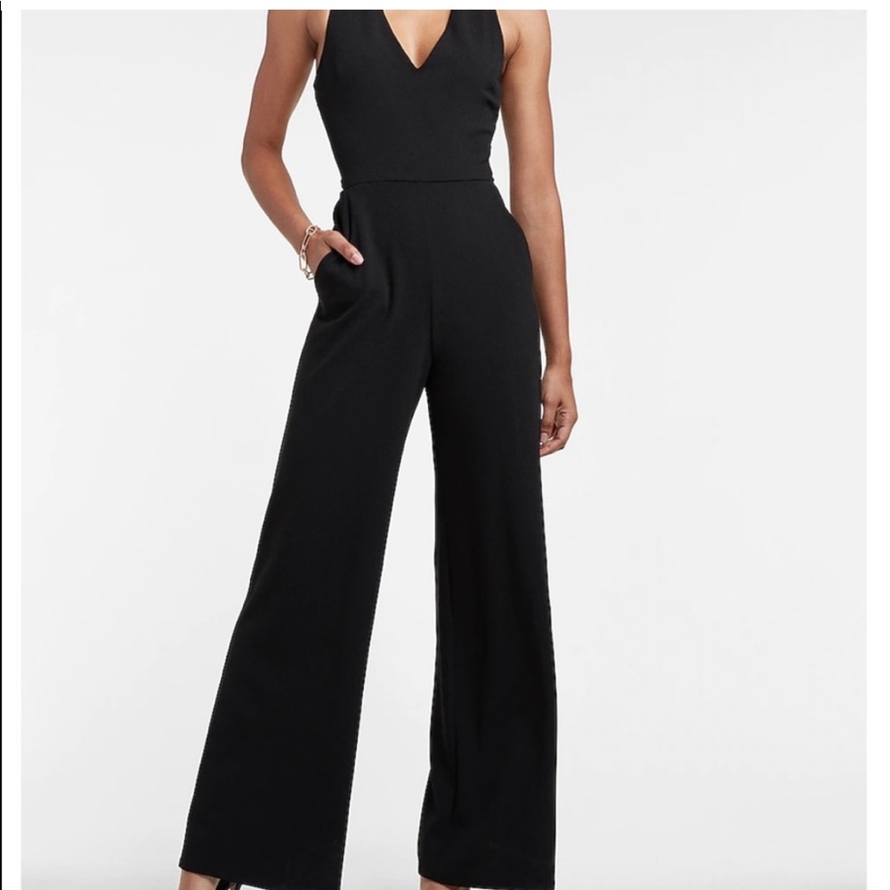 Express v neck cross cross cross back light pink jumpsuit with pockets